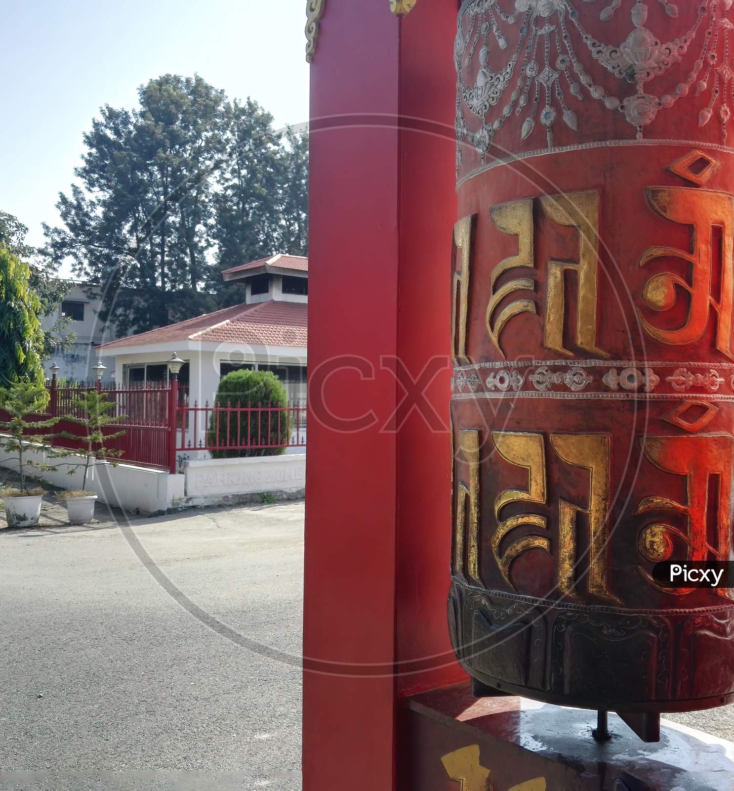 Dehradun, India: Prayer Wheel With Bell With Language Of Tibetan, A Cylindrical Wheel, Mantra Om Mani Padme Hum , Vertical Image, Uttrakhand