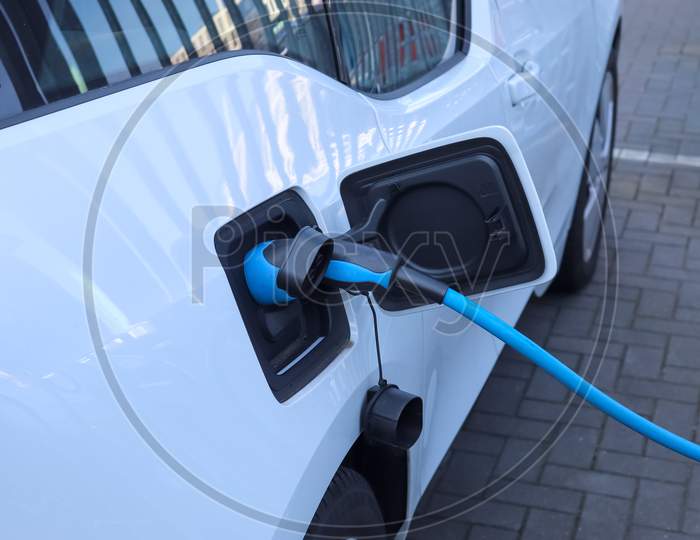 Close Up View On An Electric Charge Recharging With Energy