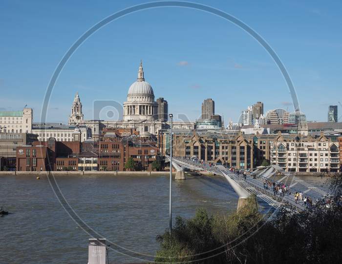 London, Uk - September 28, 2015: People Crossing The Millennium Bridge Over River Thames Linking The City Of London With The South Bank Between St Paul Cathedral And Tate Modern Art Gallery