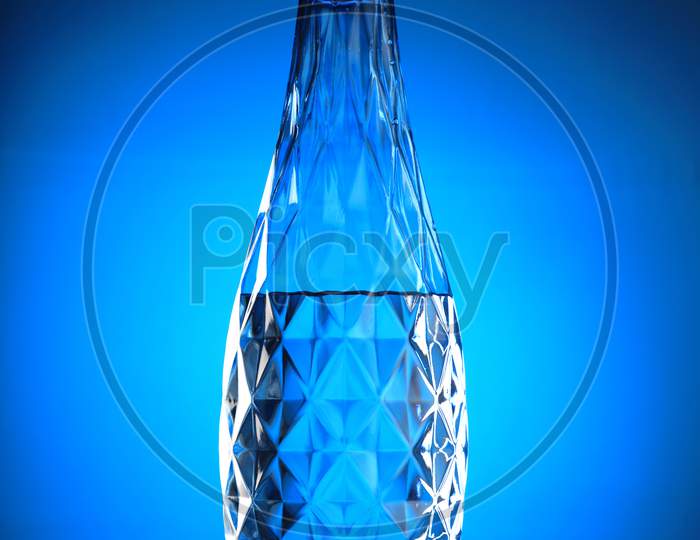Clean And Pure Mineral Drinking Water In A Blue Bottle