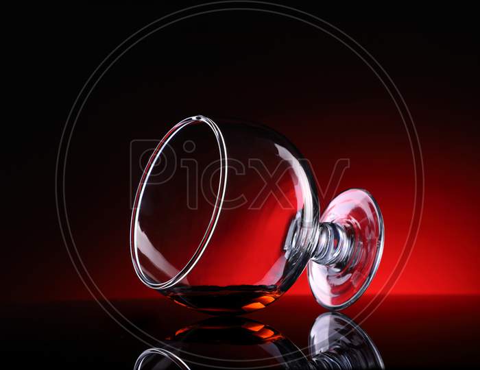 Creative Shot Of Wine Glass With Reflection
