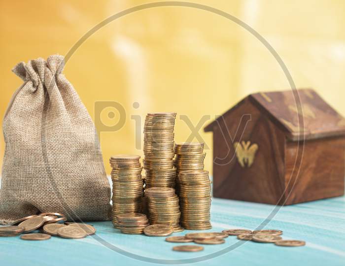Money Of Coins In A Bag For House