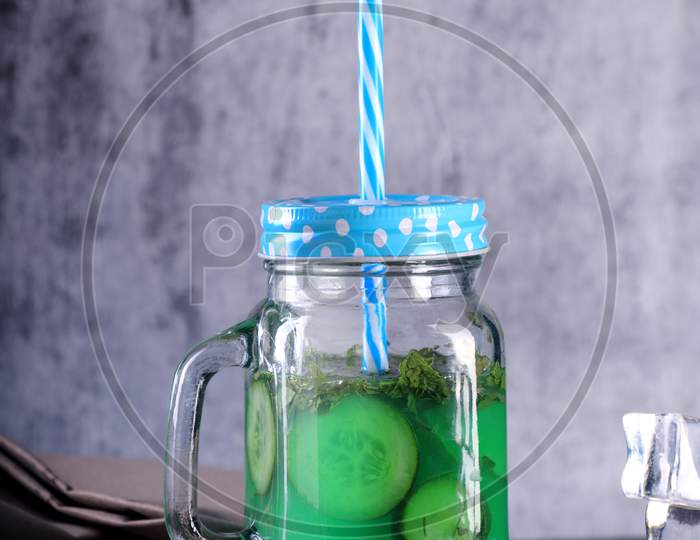 Fresh Cucumber Juice In A Mason Jar With Ice Cubes