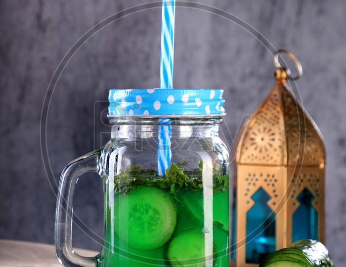 Fresh Cucumber Juice In A Mason Jar With Star Anise And Cinnamon