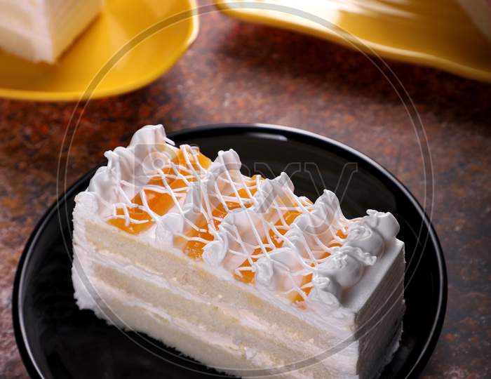 Fresh Dessert Pineapple Pastry Cake On Old Rustic Background