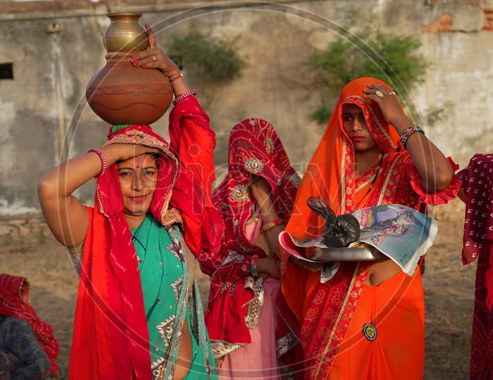 Religious Females Group With Clay Pot And Sacred Worship Plate. Traditional Women In Hindu Cultured Saree.