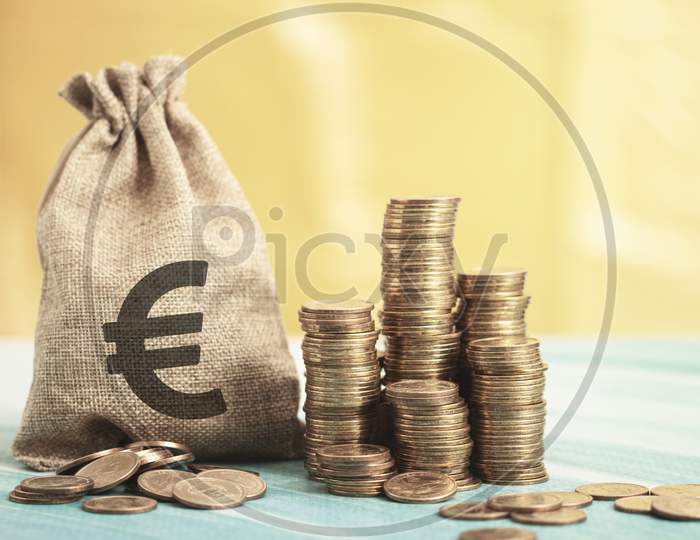 Euro Money Bag With Coins On The Floor