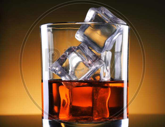 Chilled Whisky / Rum Glass With Ice Cubes