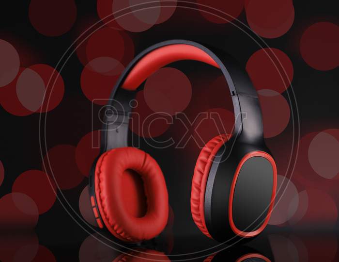 Wireless Bluetooth Headphones Music In Red And Black Color With Bokeh