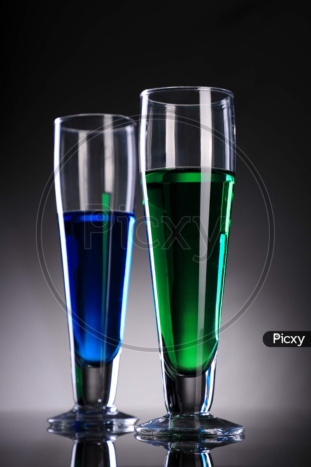 Green And Blue Glasses With Juice / Cocktail / Drink