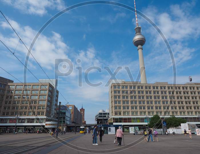 Berlin, Germany - Circa June 2019: People In Alexanderplatz Square