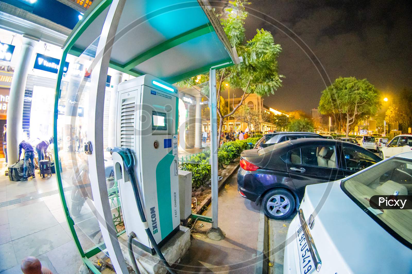 Fisheye Wideangle Shot Of Exicom Fast Car Charger With A Pay And Charge Concept Showing The Growth Of Electric Vehicles In India And Increase In Charging Points And Infrastructure