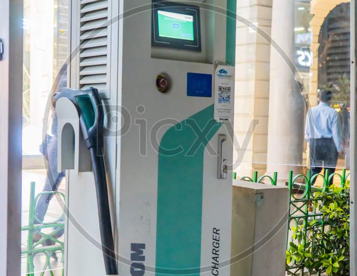Wideangle Shot Of Exicom Fast Car Charger With A Pay And Charge Concept Showing The Growth Of Electric Vehicles In India And Increase In Charging Points And Infrastructure