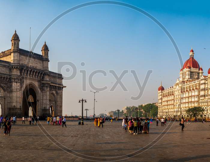 Every Year Thousands Of Tourist Visit The Most Famous Attractions Of Mumbai - The Taj Mahal Palace Hotel And Gateway Of India.