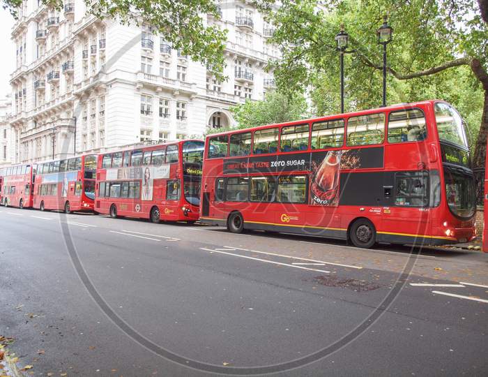 London, England, Uk - October 23: Row Of Double Decker Red Buses Waiting To Depart From On October 23, 2013 In London, England, Uk