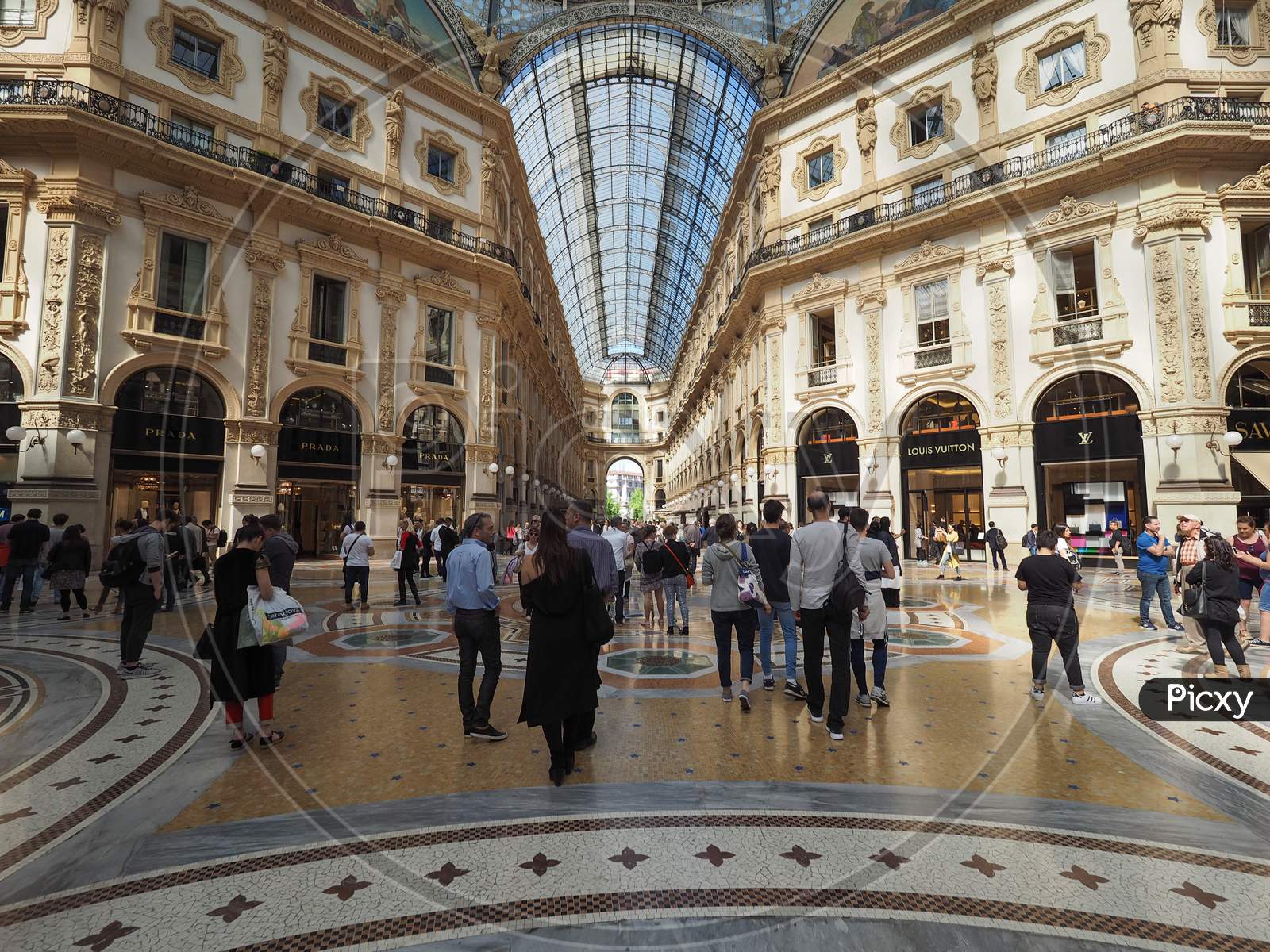 Milan, Italy - Circa April 2016: Tourists In Galleria Vittorio Emanuele Ii Gallery
