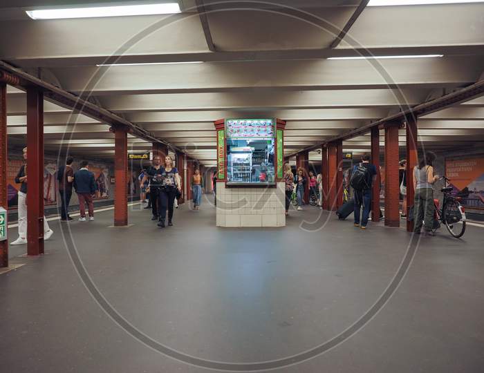 Berlin, Germany - Circa June 2019: People In Alexanderplatz Underground Station