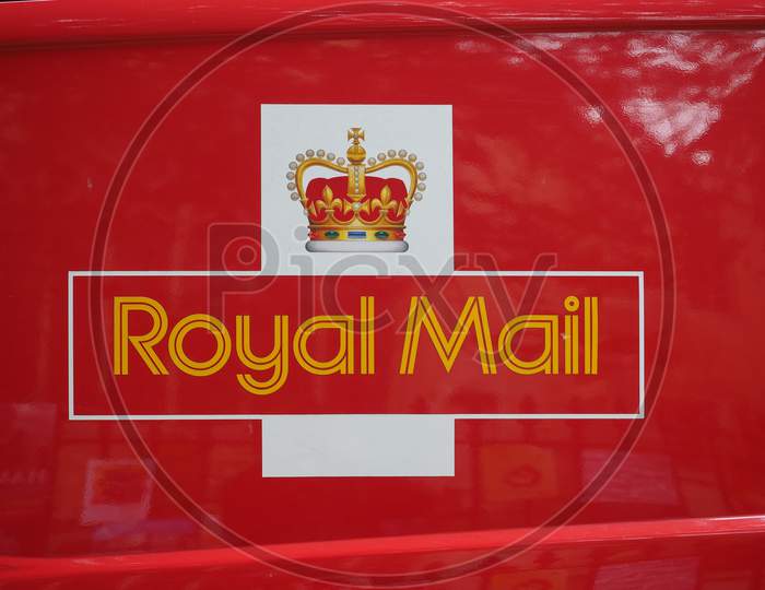 Cambridge, Uk - Circa October 2018: Sign On Red Royal Mail Van