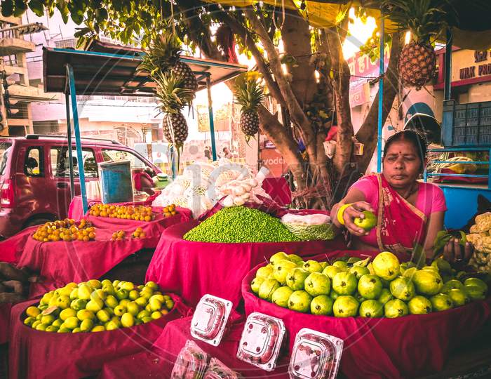 Old lady selling fruits