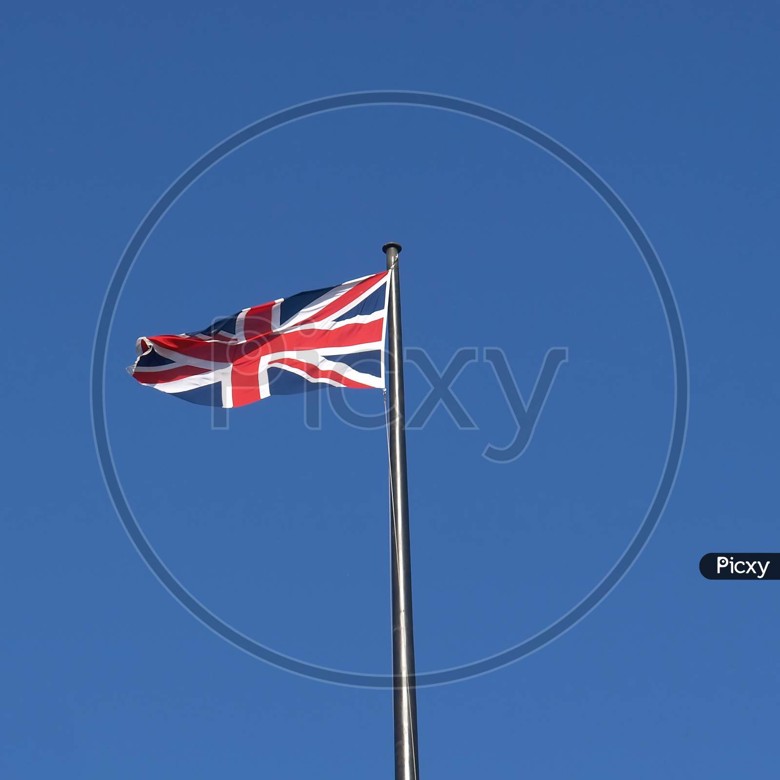 Uk Flag Over Blue Sky