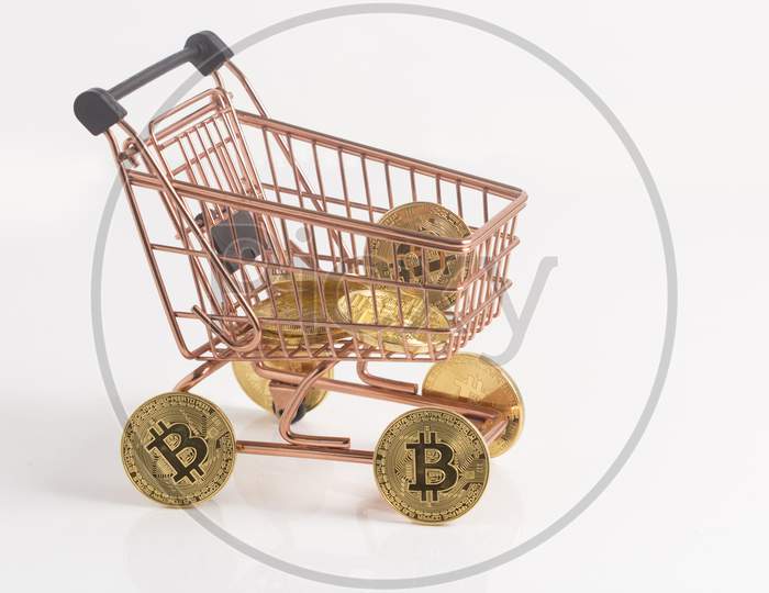 Copper Shopping Cart With Bitcoins, Stock Photo