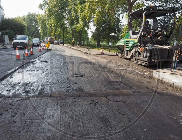 London, Uk - September 29, 2015: Paving Works To Remove And Lay New Tarmac Asphalt On A Road
