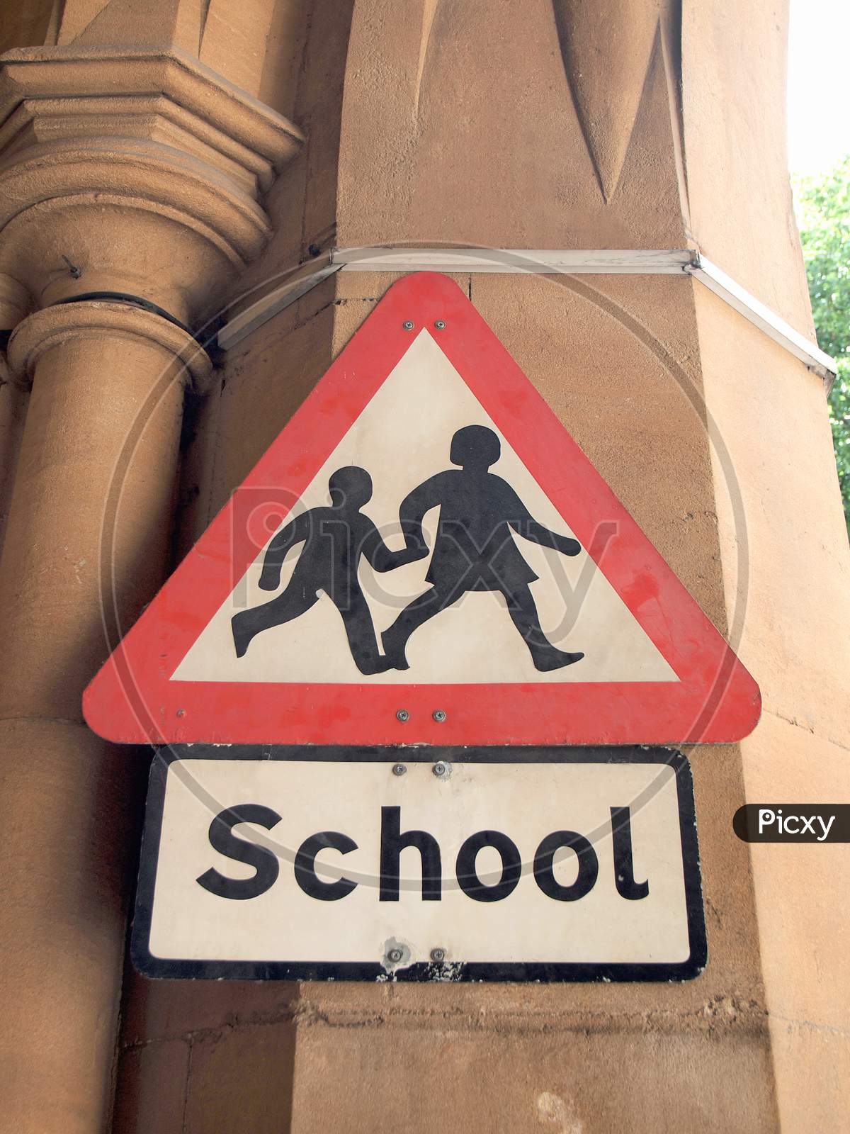School Sign On A Wall