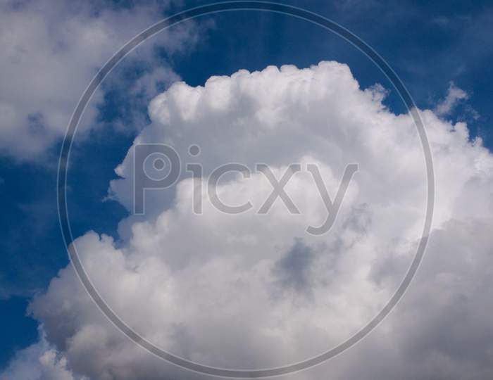 Blue Sky With Clouds Background