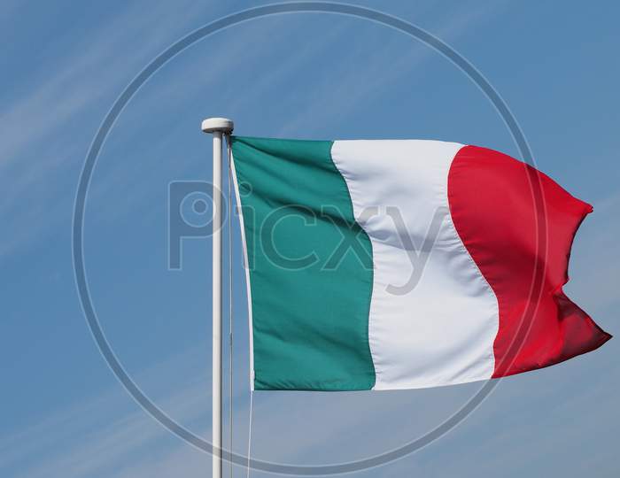 Italian Flag Of Italy Over Blue Sky