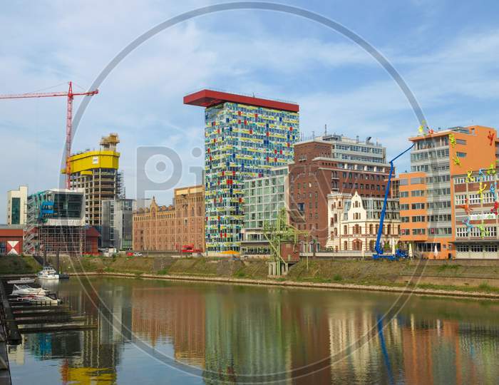 Duesseldorf, Germany - August 03, 2009: The New Medienafen Is A Redevelopment Area In The Former Docklands And Harbour With Buildings Designed By Steven Holl, David Chipperfield And Frank O Gehry