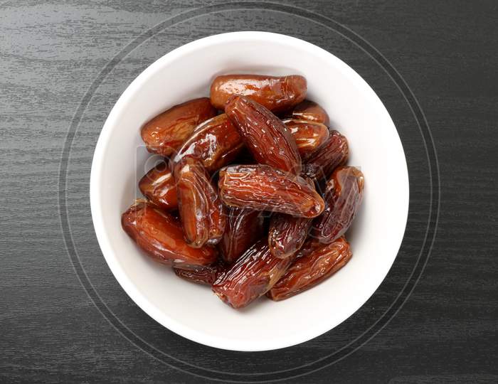 Fresh Dates In A White Bowl
