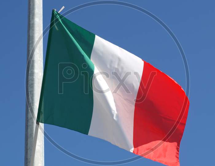 Italian Flag Over Blue Sky