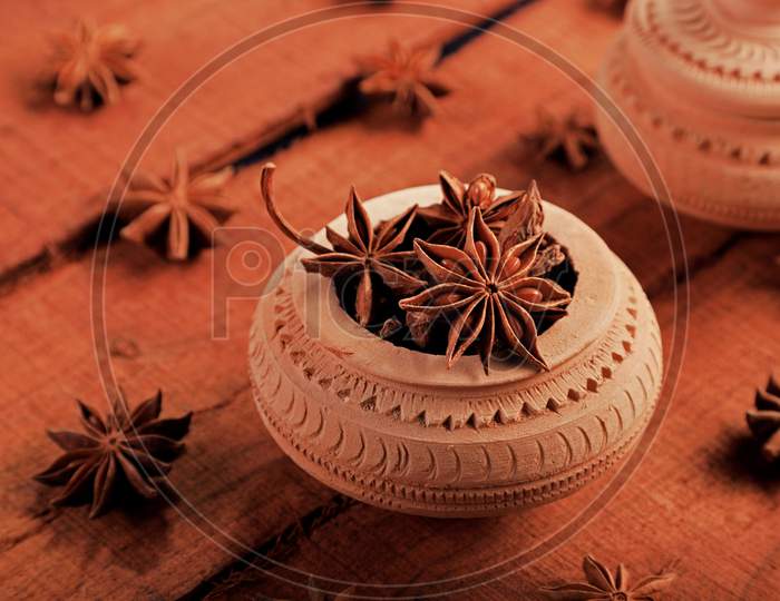 Indian Spice Star Anise In A Handicraft Pot
