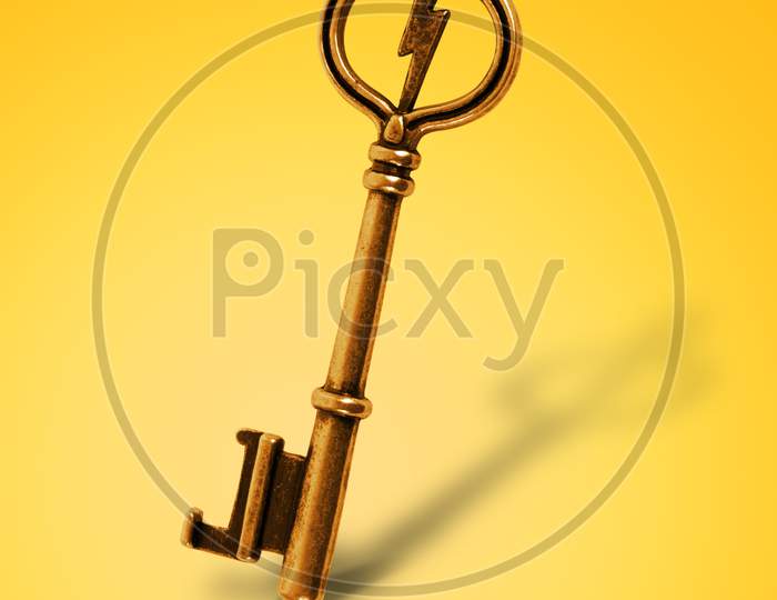 Old Gold Vintage Key In White Background