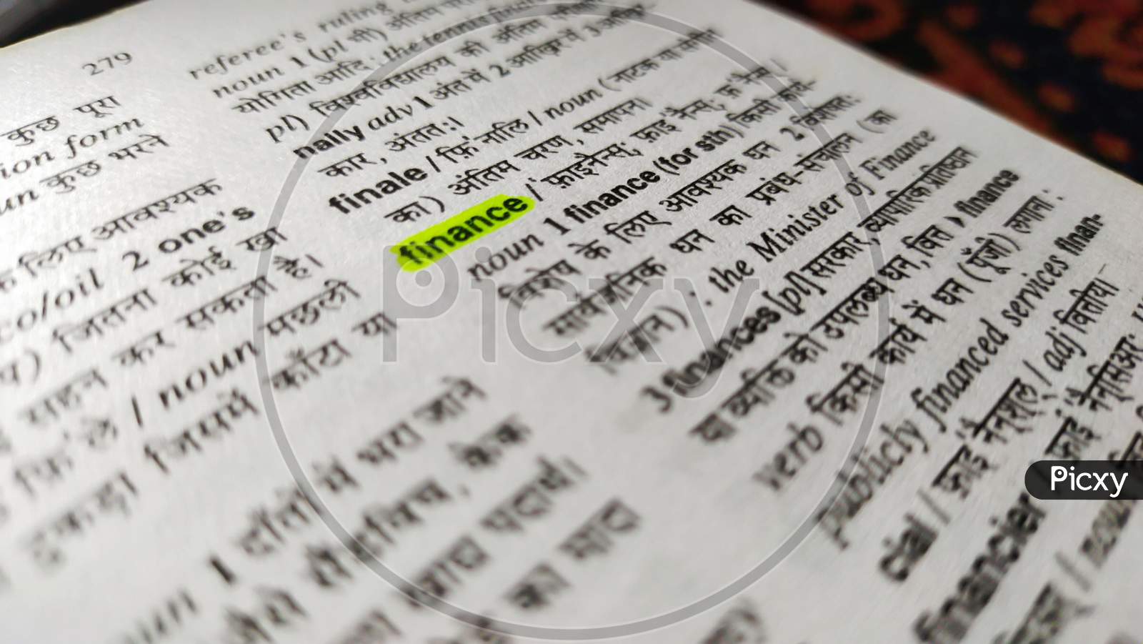 Finance word highlighted in a english to hindi dictionary