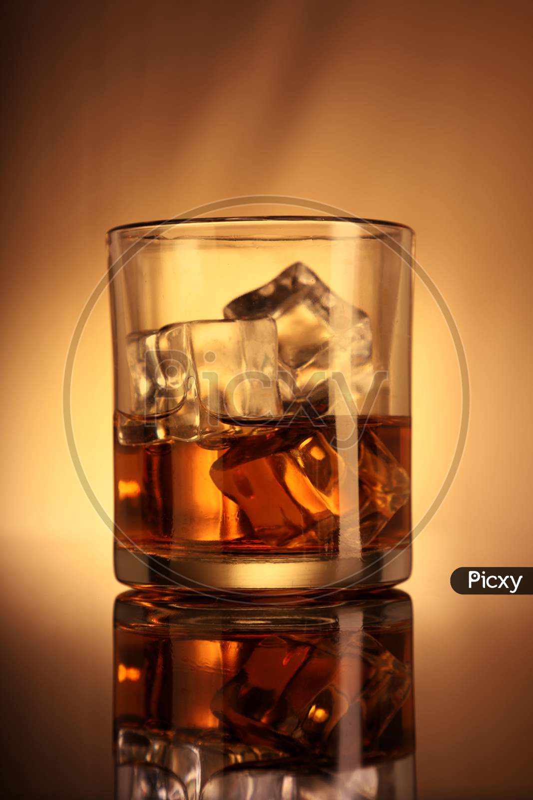 Single Whiskey Glass With Ice Cubes