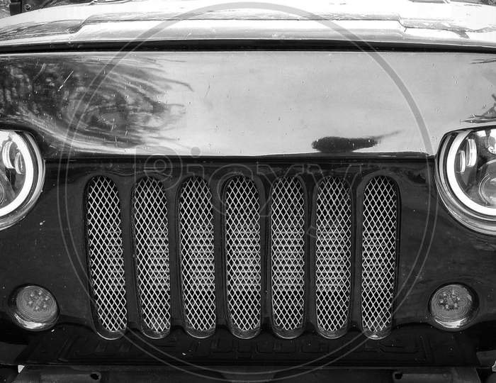 Black and white picture of a car front look