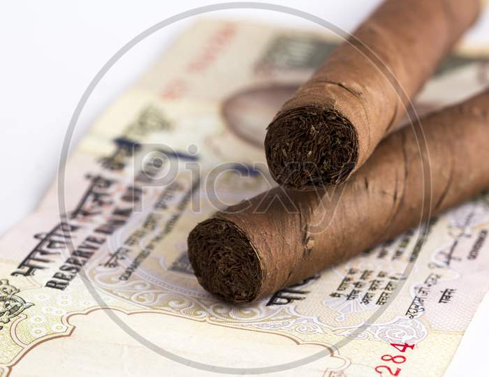Cash And Cigars Stock Photo