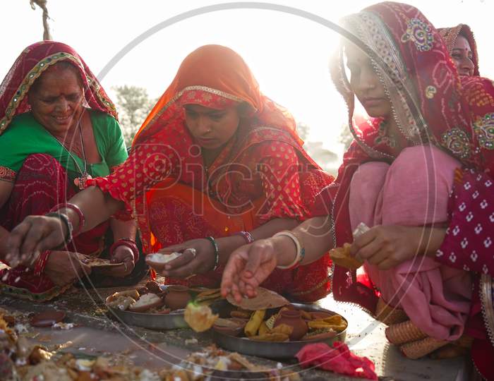 Cultured Women In Different Attires And Offering Sacred Food On Navratra Festival. Ramnavmi Hindu Festival Concept.