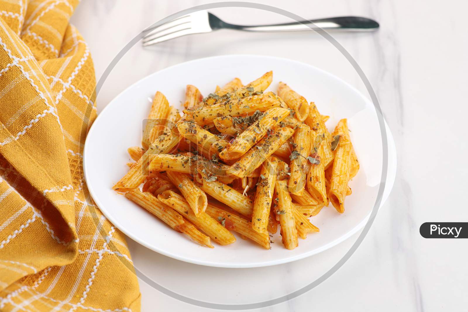 Food - Delicious Penne Pasta Plate With A Fork On White Marble Background