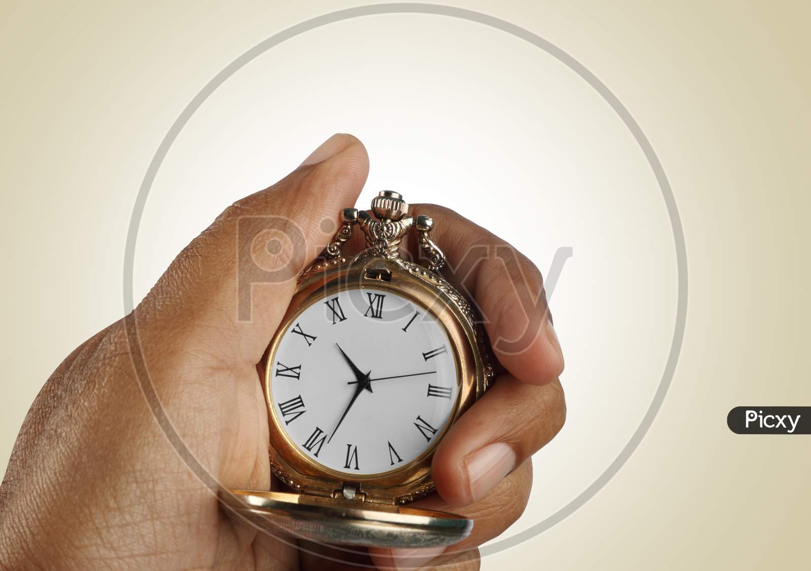 Old Golden Antique Watch In A Hand