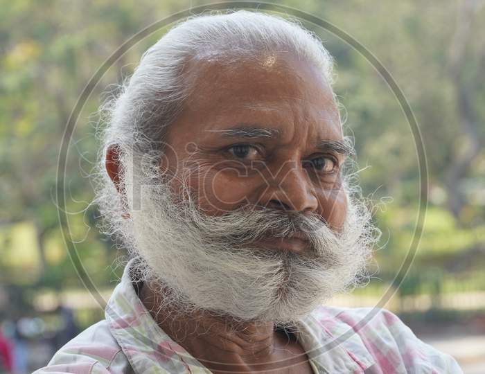 Indian man with moustache and beard