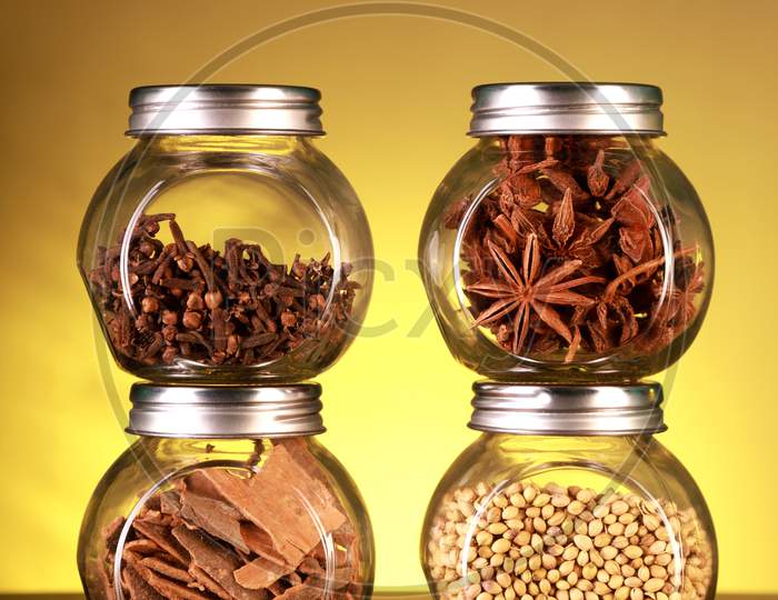 Spice Jars With Star Anise, Cloves, Cinnamon, Coriander Seeds