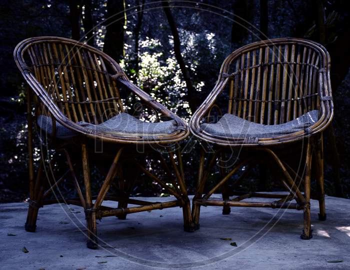 Beautiful Picture Of Two Chairs In Jungle. Background Blur