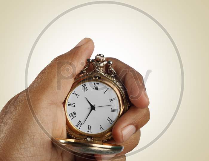 Old Golden Antique Watch In A Hand