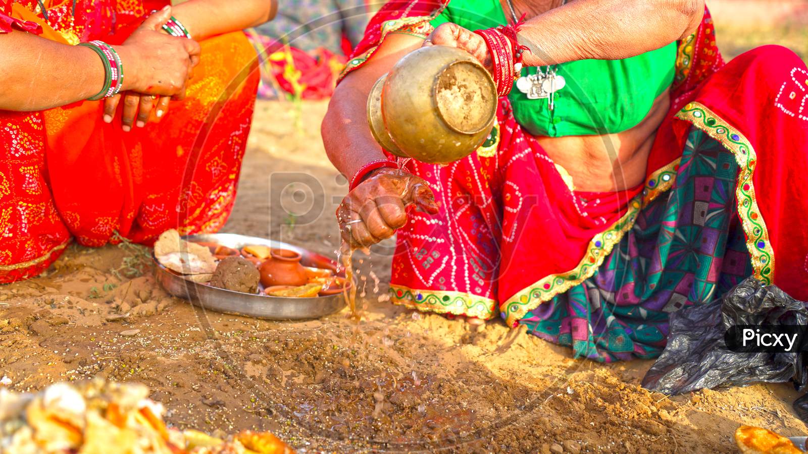 Offerings In Hinduism Ceremony. Two Bronze Mug With Holy Water To Offering God On Ground.
