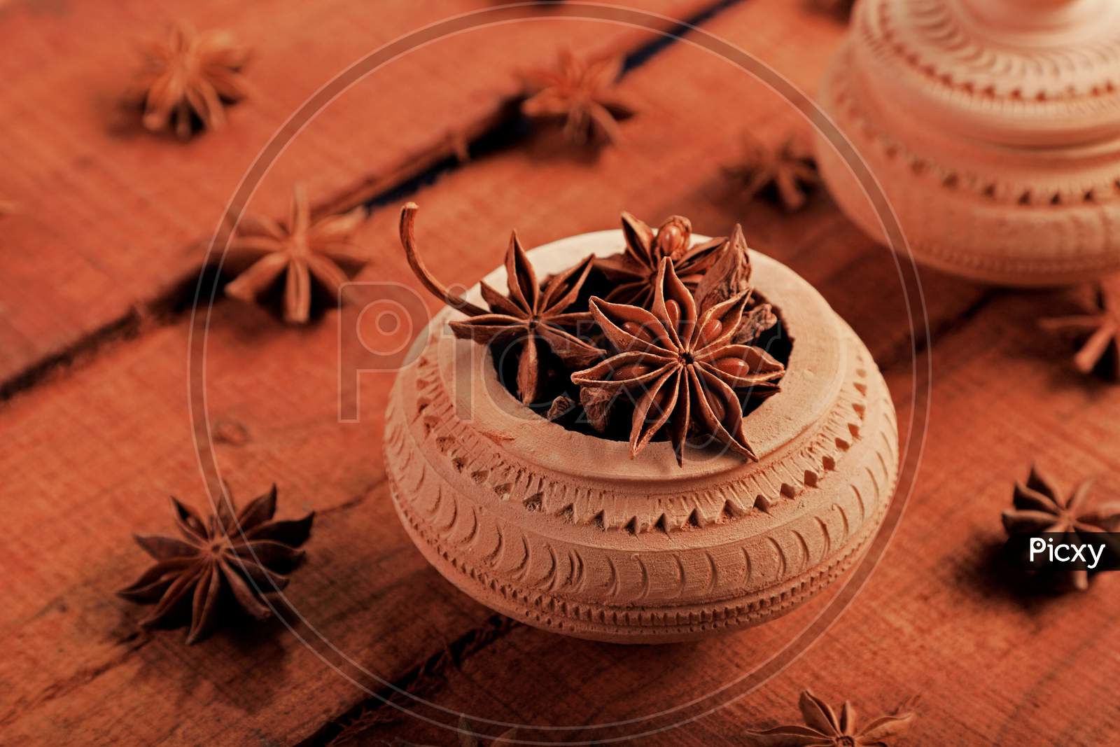Indian Spice Star Anise In A Handicraft Pot