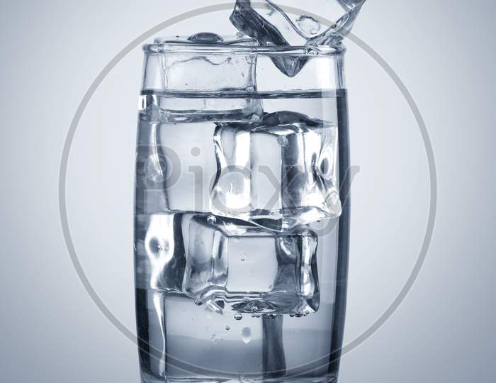 Chilled Glass Of Water With Ice Cubes