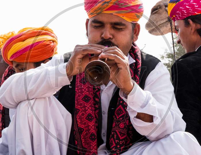 Portrait of artist in traditional rajasthani dress at Bikaner Camel festival