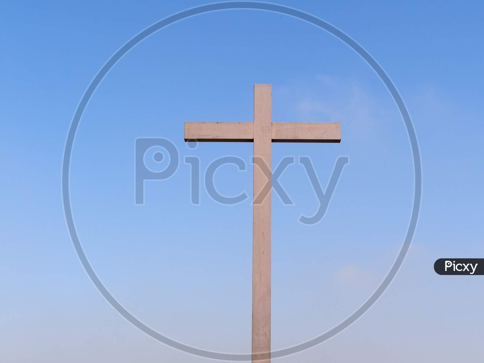 Wooden Cross Over Blue Sky